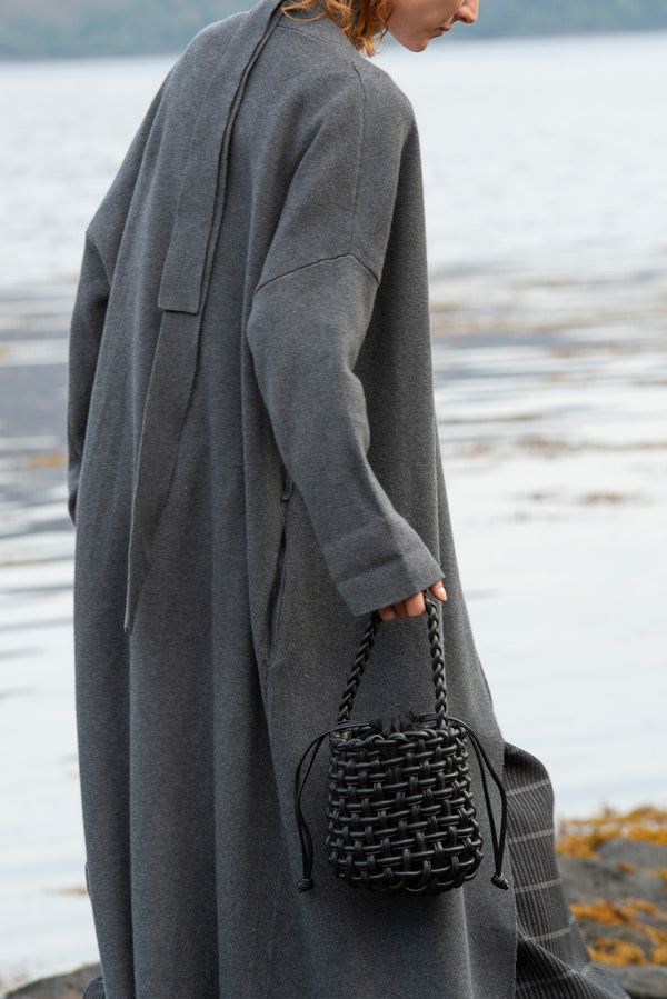  Woman with the Bombolin black leather bag