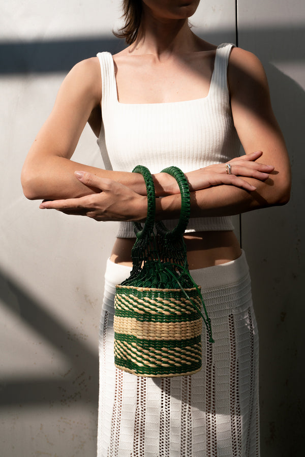 Standing women with VARKALA bag